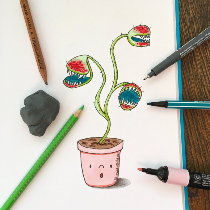 foto van getekend kawaii bloempotje met vleesetend plantje en tekenmateriaal