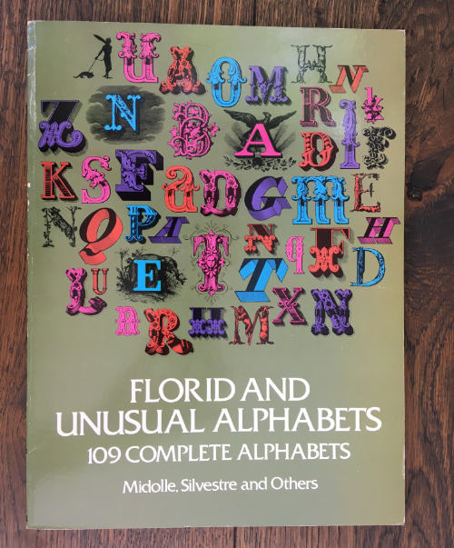foto van het boek Florid and Unusual Alphabets van Midolle, Silvestre and others