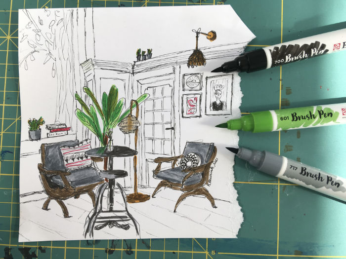 foto van pentekening woonkamer die wordt ingekleurd met brush pennen