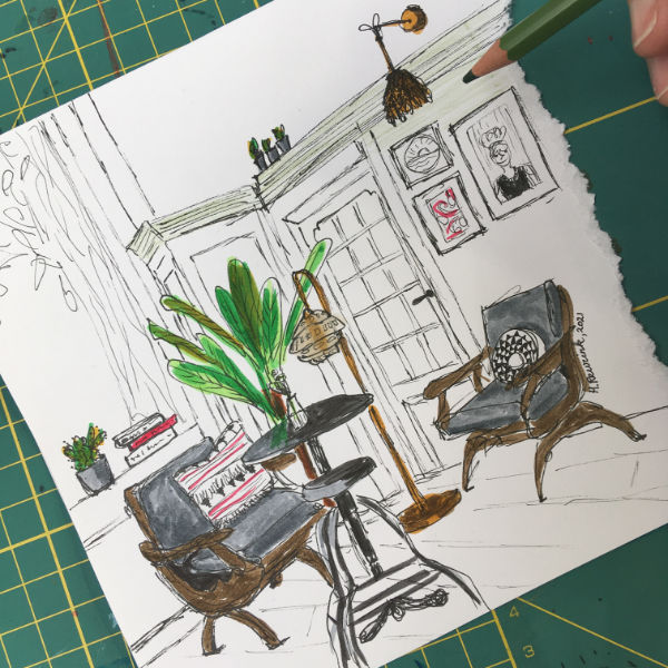 foto van pentekening woonkamer die wordt ingekleurd met kleurpotlood