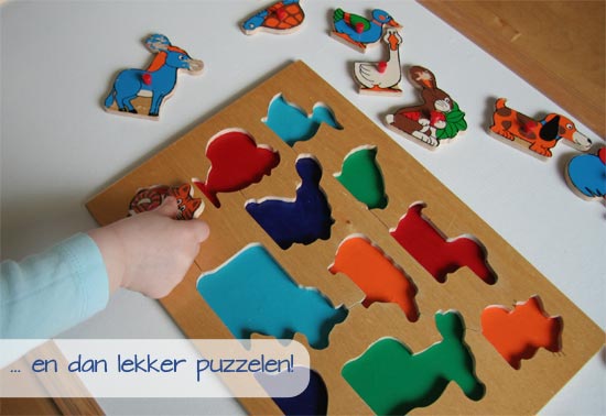 foto houten puzzel boerderijdieren waarvan binnenkant geverfd met acrylverf