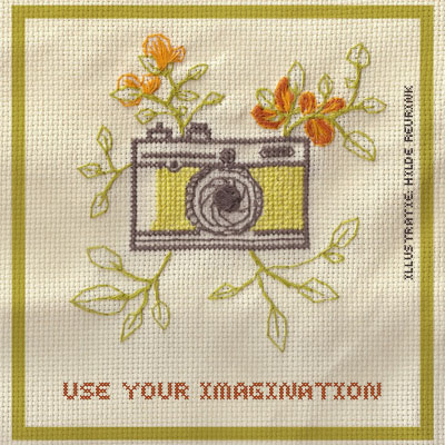 borduursel met fototoestel en bloemen